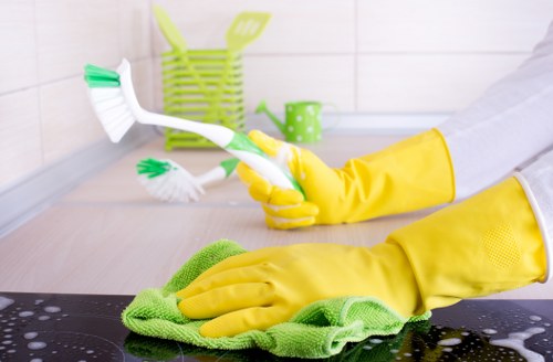 Supervisor checking emergency readiness during cleaning work