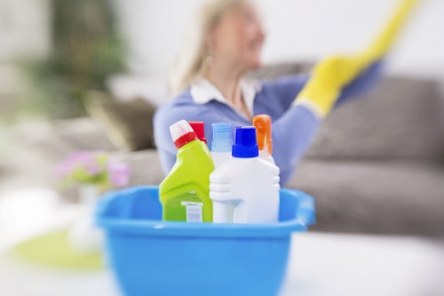 Professional oven cleaner in Brixton deep cleaning a kitchen oven
